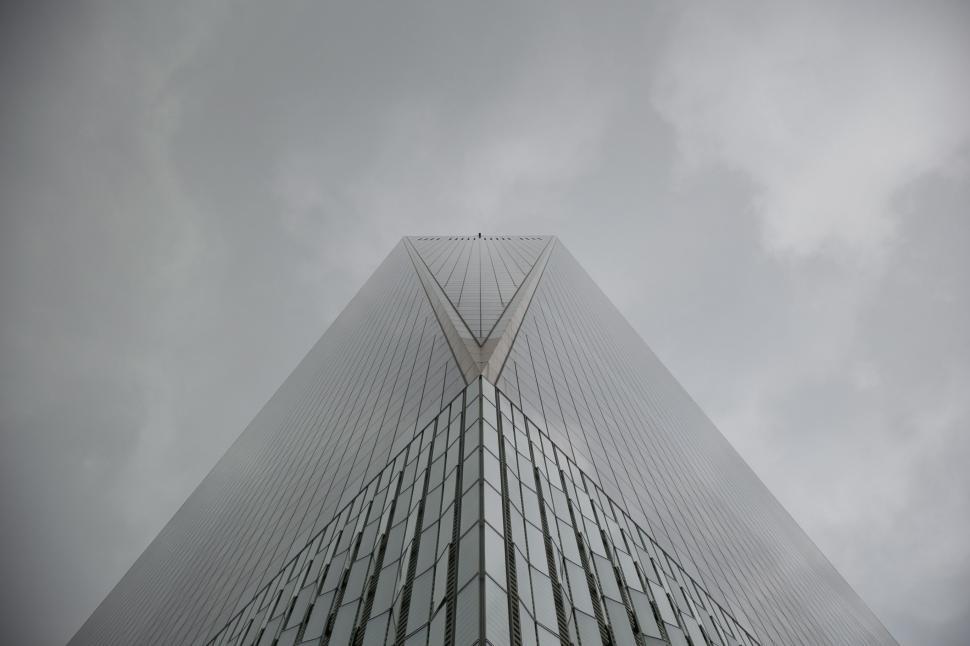 Free Image of Corner view of a glass skyscraper 