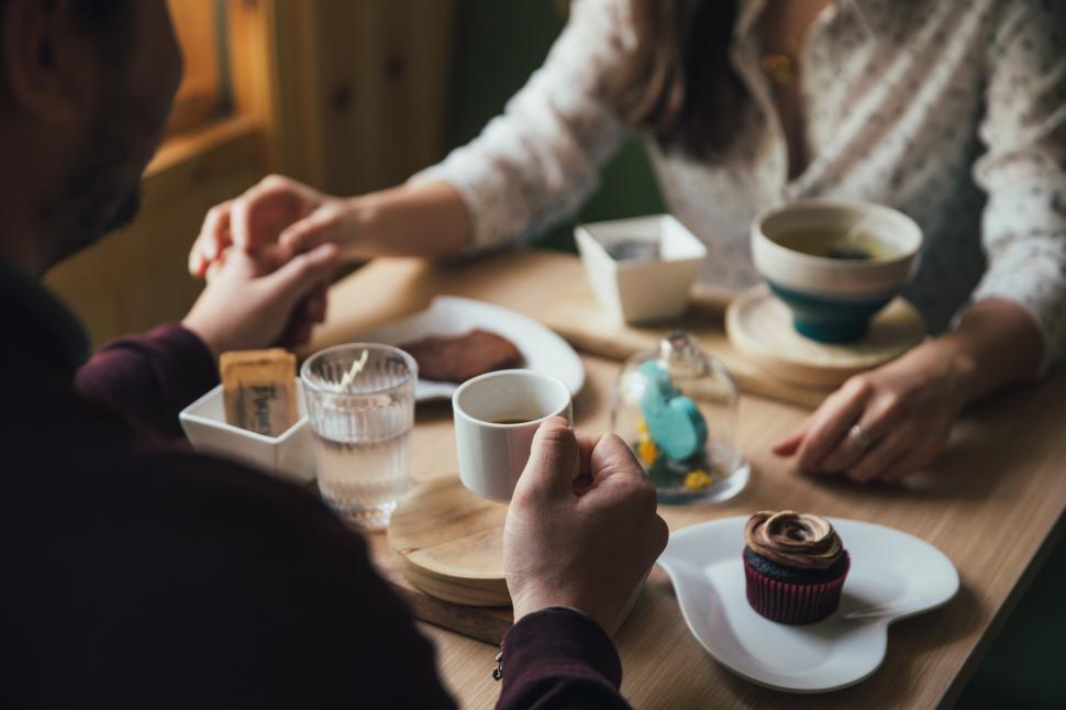 Free Image of A young couple on a coffee date 