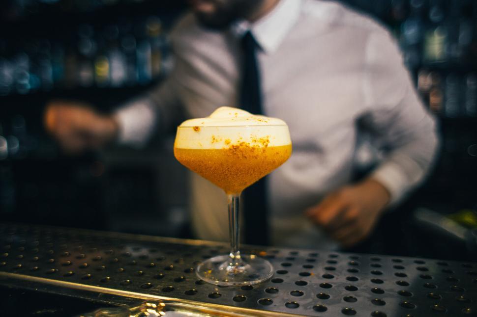 Free Image of Egg white cocktail on the bar counter 
