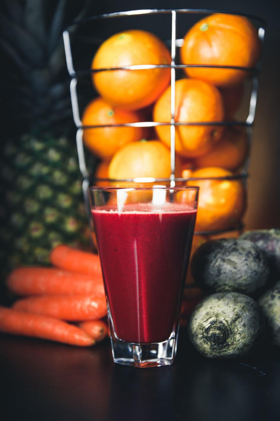 Free Image of Close-up of a glass of beetroot juice with other fruits 