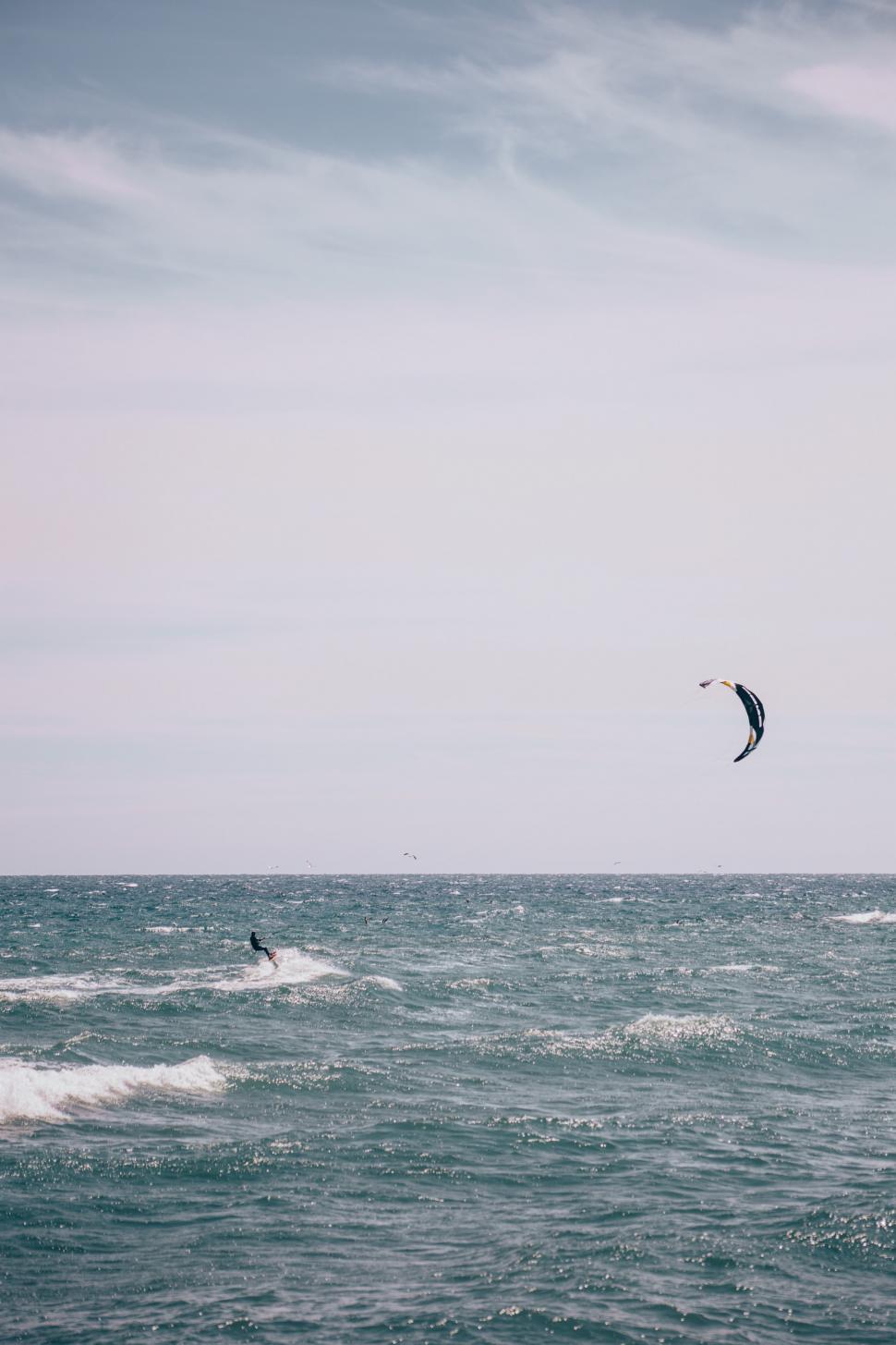 Free Image of Surfboarding with surfing kite 