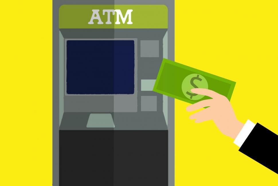 Free Image of using ATM machine  