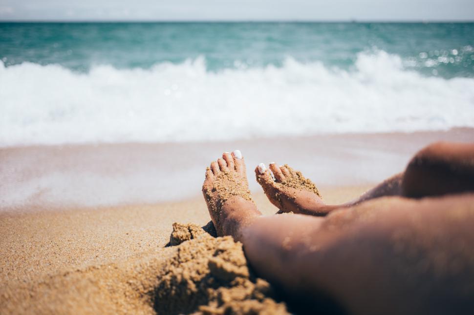 Free Image of Sandy feet on the beach 
