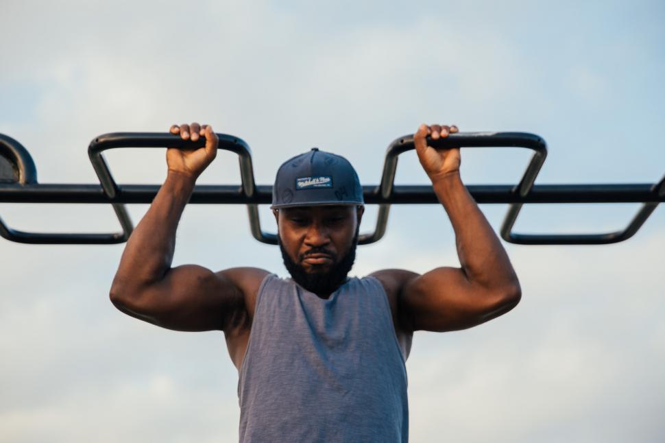 Free Image of A young african man doing chin-up exercise 