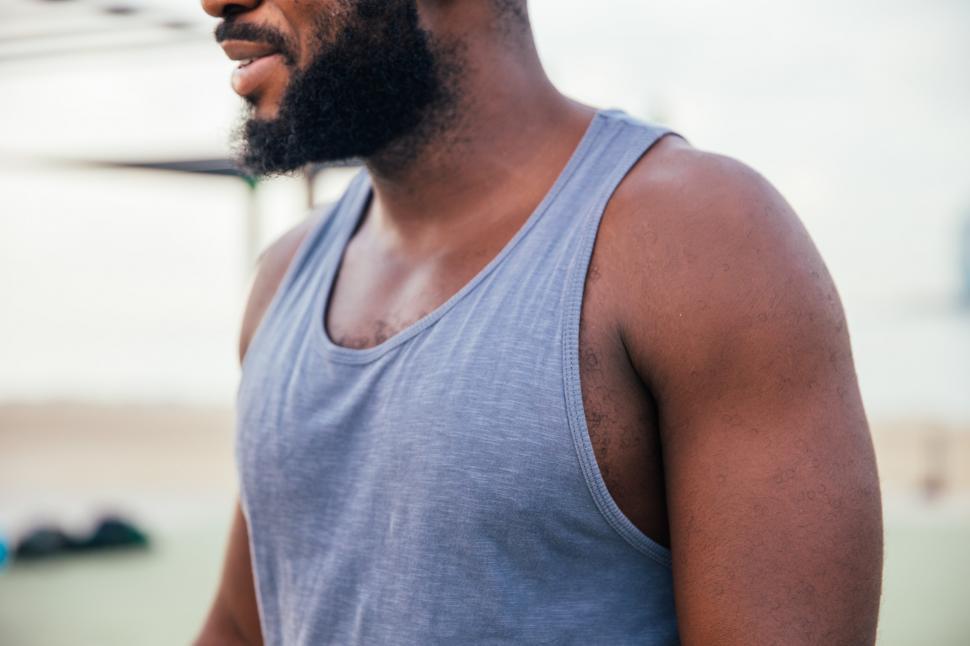 Free Image of A young African man in tanktop 