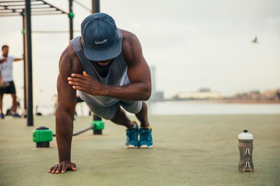 Free Image of One armed push-up exercise by a young african man 