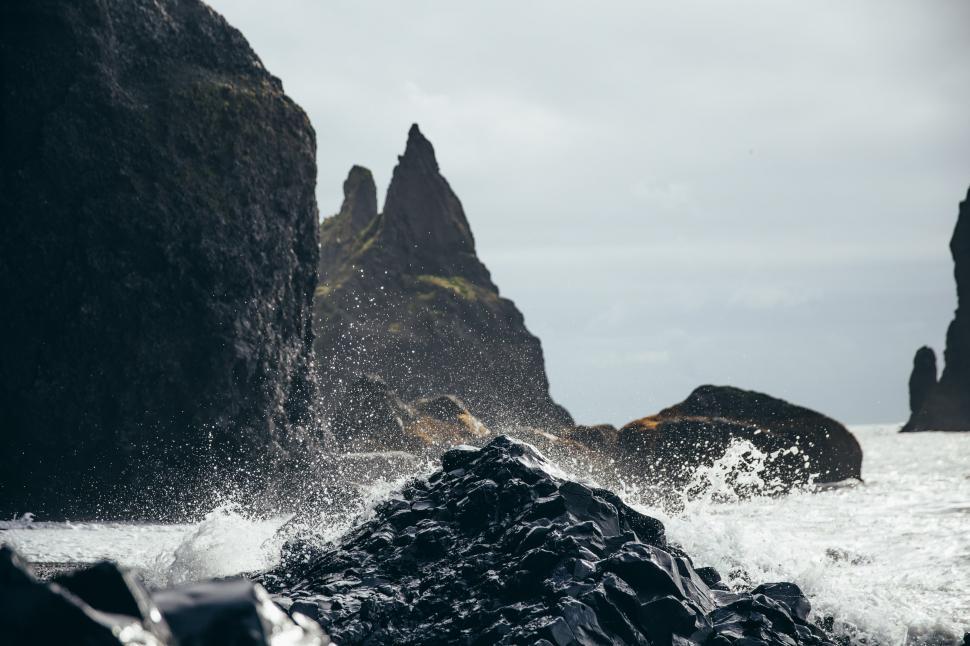 Free Image of Black volcanic rocks by the sea 