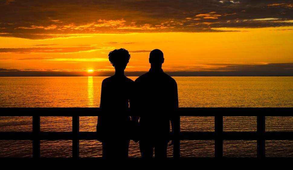 Free Image of couple watching sunset  