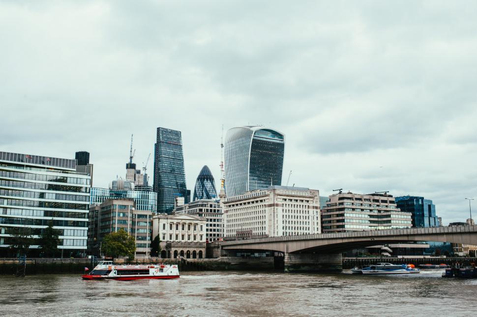 Free Image of Thames river with London skyscrapers in the background 