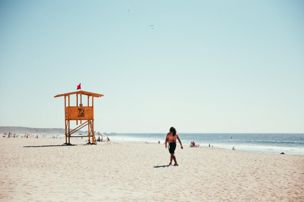 Free Image of A lifeguard tower on the beach 
