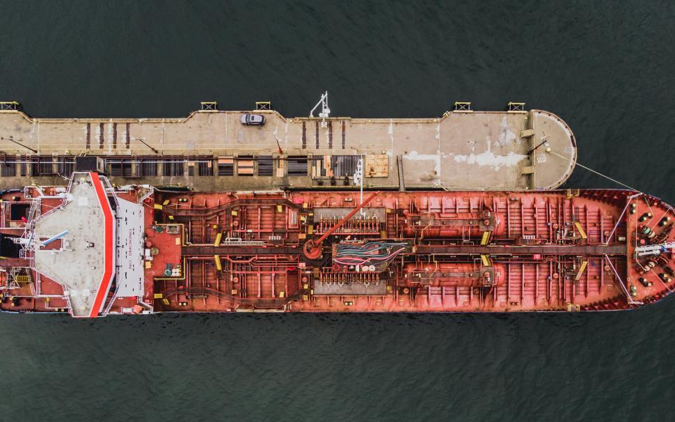 Free Image of Aerial view of bough of a ship docked at the port 