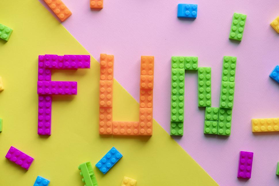 Free Image of Flat lay of the text FUN written with plastic toy bricks 