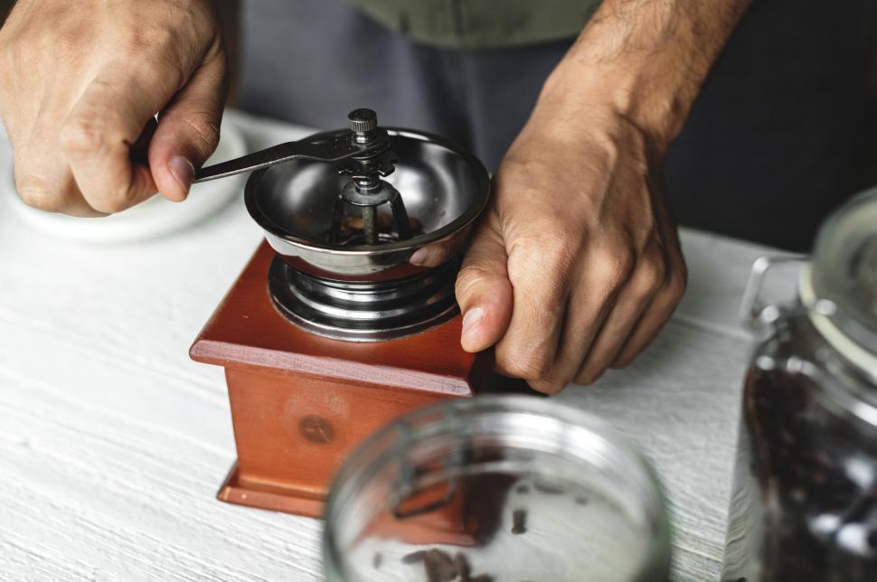 Free Image of A vintage hand coffee grinder 