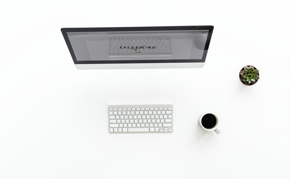 Free Image of Flat lay of a desktop PC on white surface 