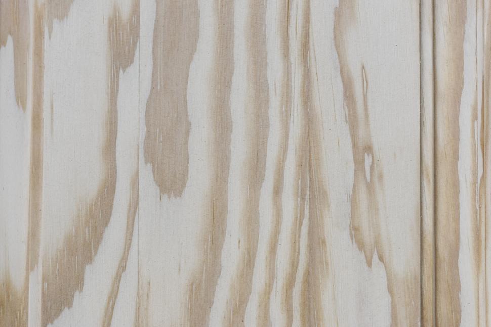 Free Image of Abstract wood texture of brown on cream fabric 