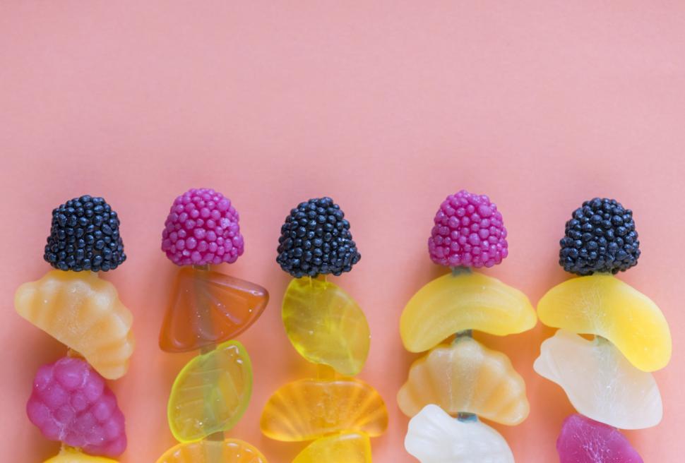 Free Image of Colorful hard fruit candy skewers 