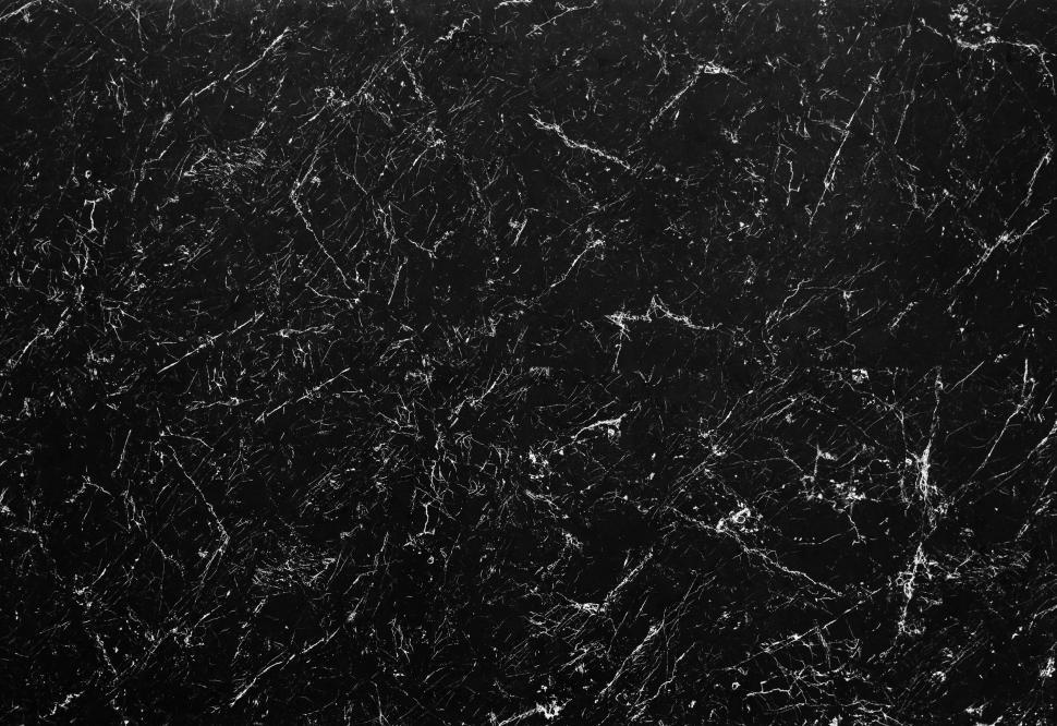 Download Free Stock Photo of Cracked surface texture on black marble 