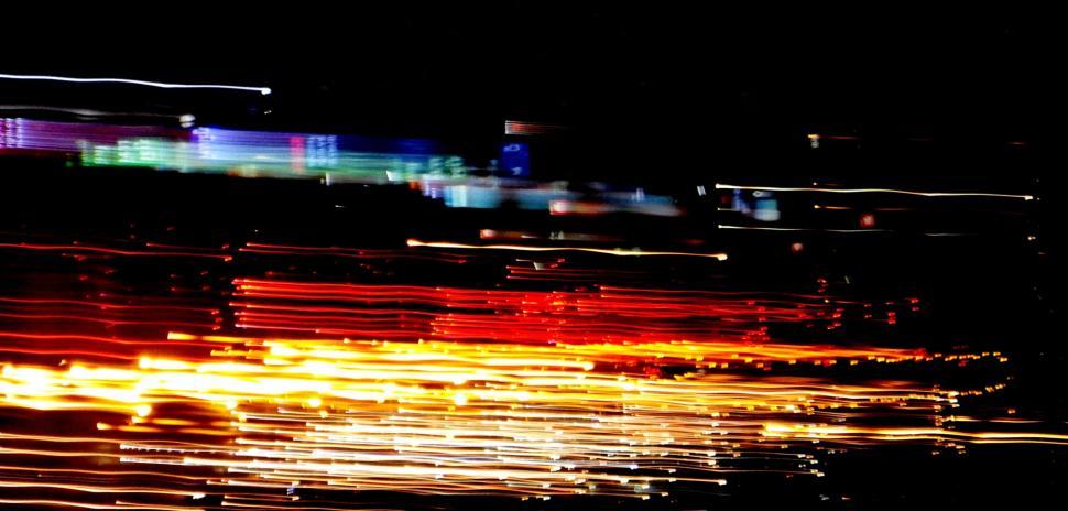 Free Image of Abstract image of night light trails in the city with motion blur  
