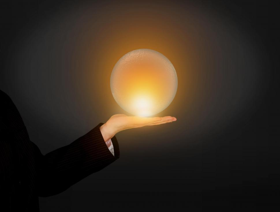 Free Image of Hand Holding Glowing Crystal Ball - Predicting the Future Concept - Divination  