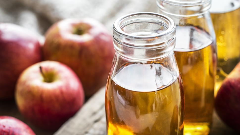 Free Image of Close up of apple juice bottles 