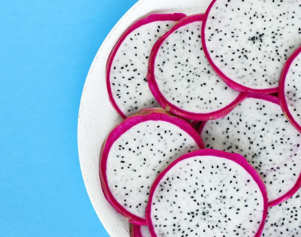Free Image of Flat lay of dragon fruit slices 