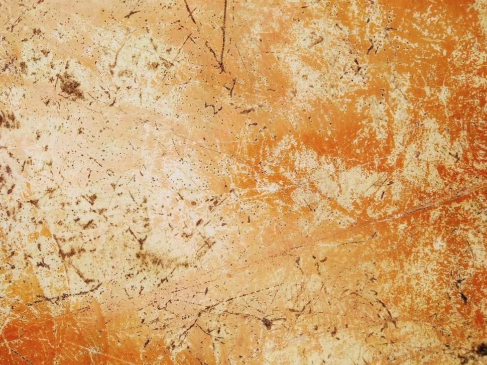 Free Image of Grungy Orange Scratched Wall Texture  