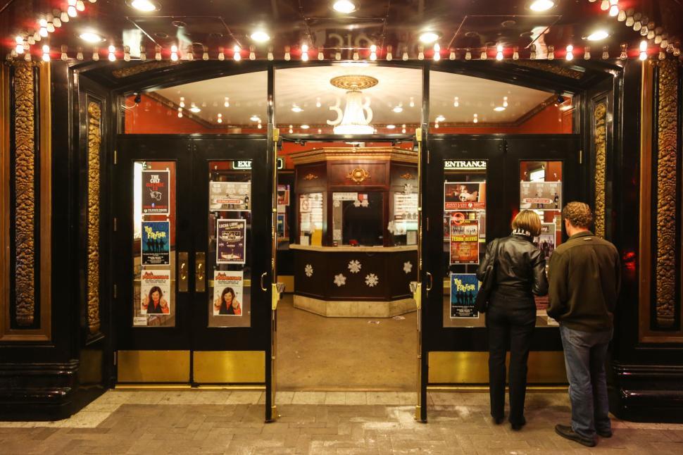 Free Image of Couple at entrance to a theater 