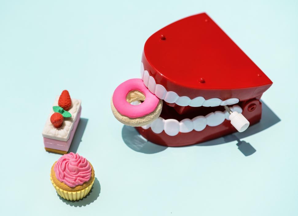 Free Image of A chattering teeth toy along with candies 