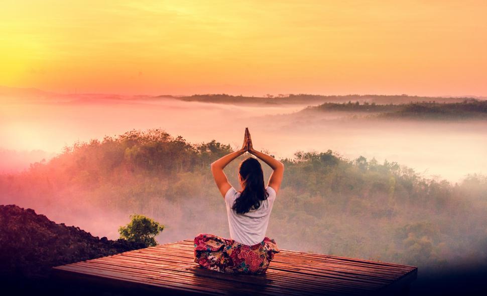Download Free Stock Photo of Woman Practicing Yoga at Sunrise Over Rainforest - Dawn 