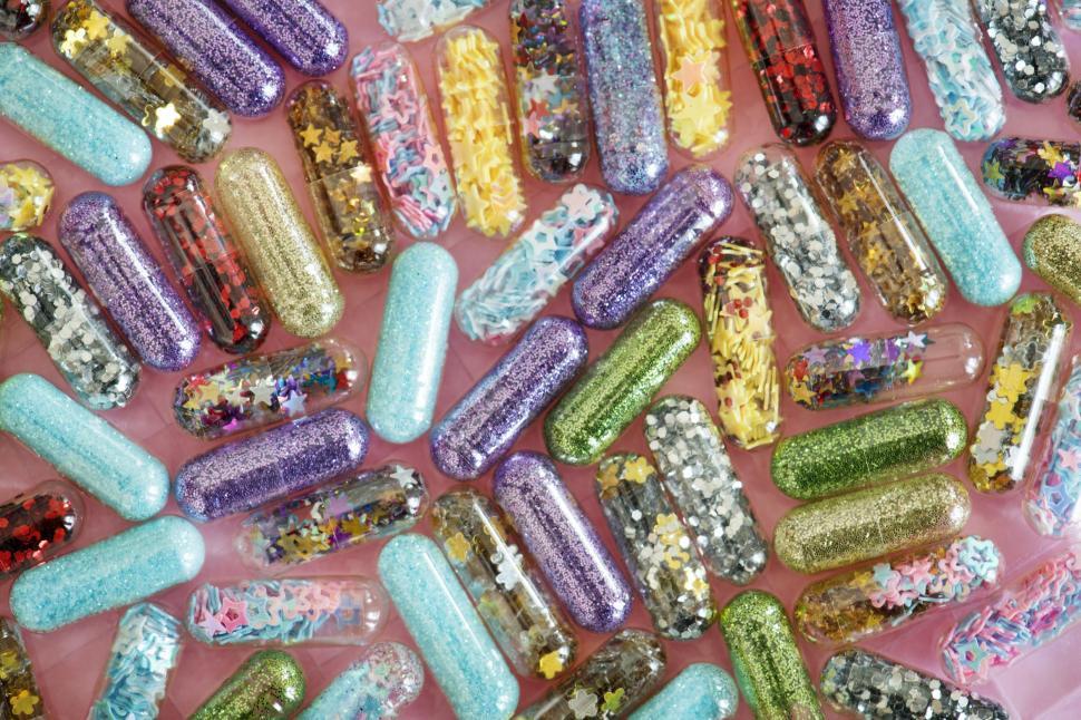 Free Image of Close up of glitter pills 