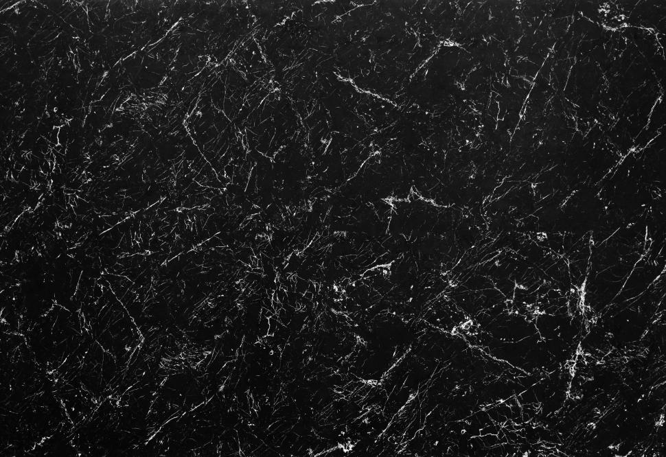 Free Image of Cracked surface texture on black marble 