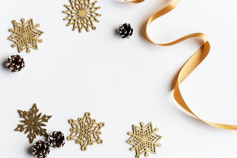 Free Image of Flat lay of Christmas decor on white surface 