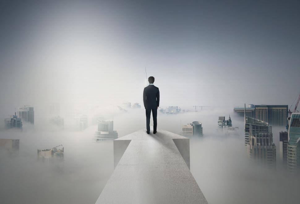 Free Image of Businessman On Arrow Over Cityscape - Growth and Success Concept 