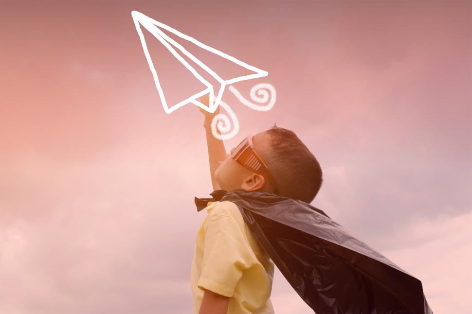 Free Image of Imagination - A Child Imagining to be a Pilot - Illustration 