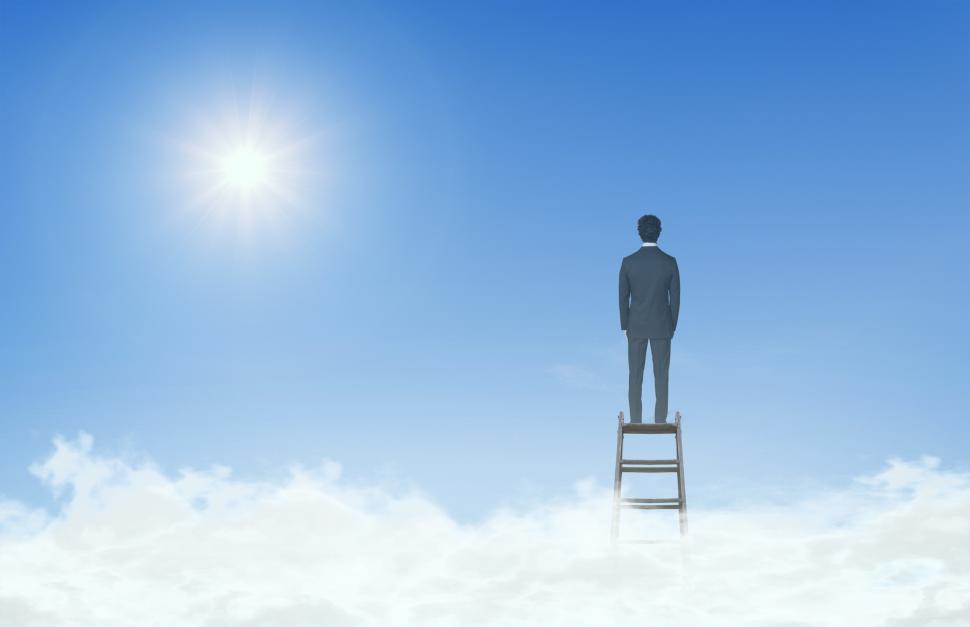 Download Free Stock Photo of Businessman On Top of Ladder Above the Clouds 