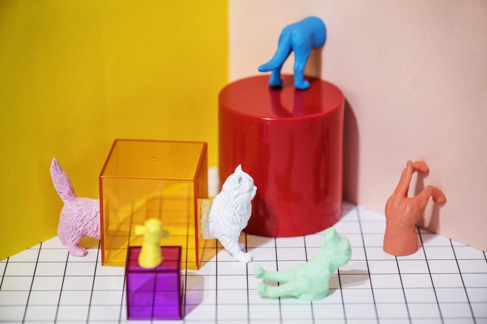 Free Image of Colorful toy animals with geometric glass figures 