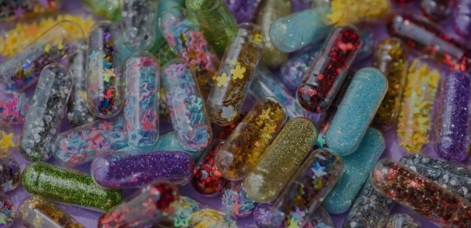 Free Image of Close up of glitter pills 