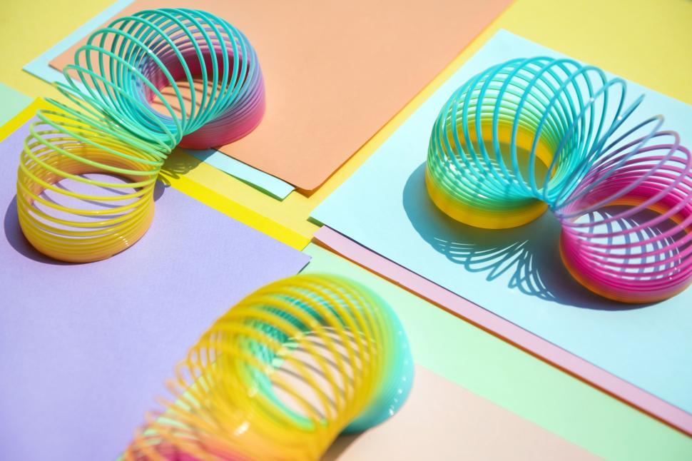 Free Image of Close up of colorful slinky toys 