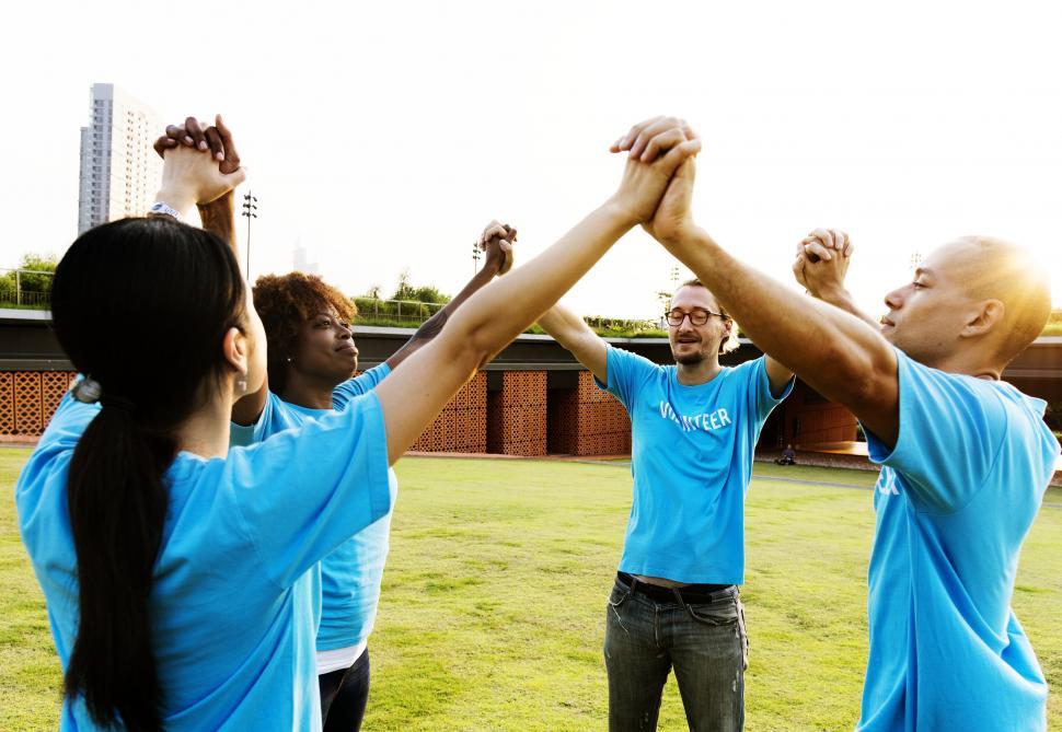 Free Image of A group of volunteers forming a circle 