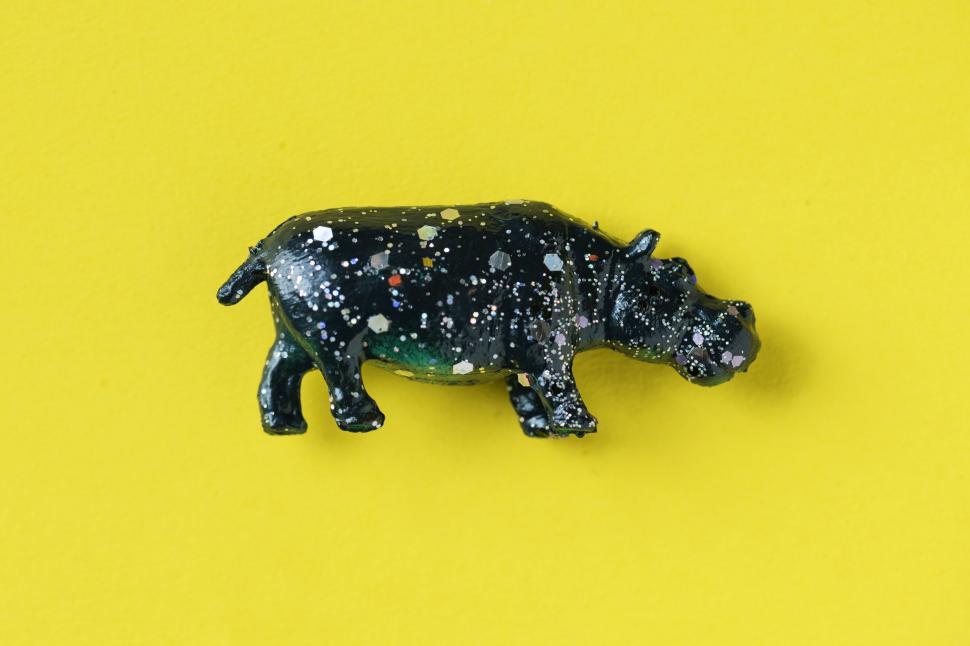 Free Image of Flay lay of a toy rhinoceros 