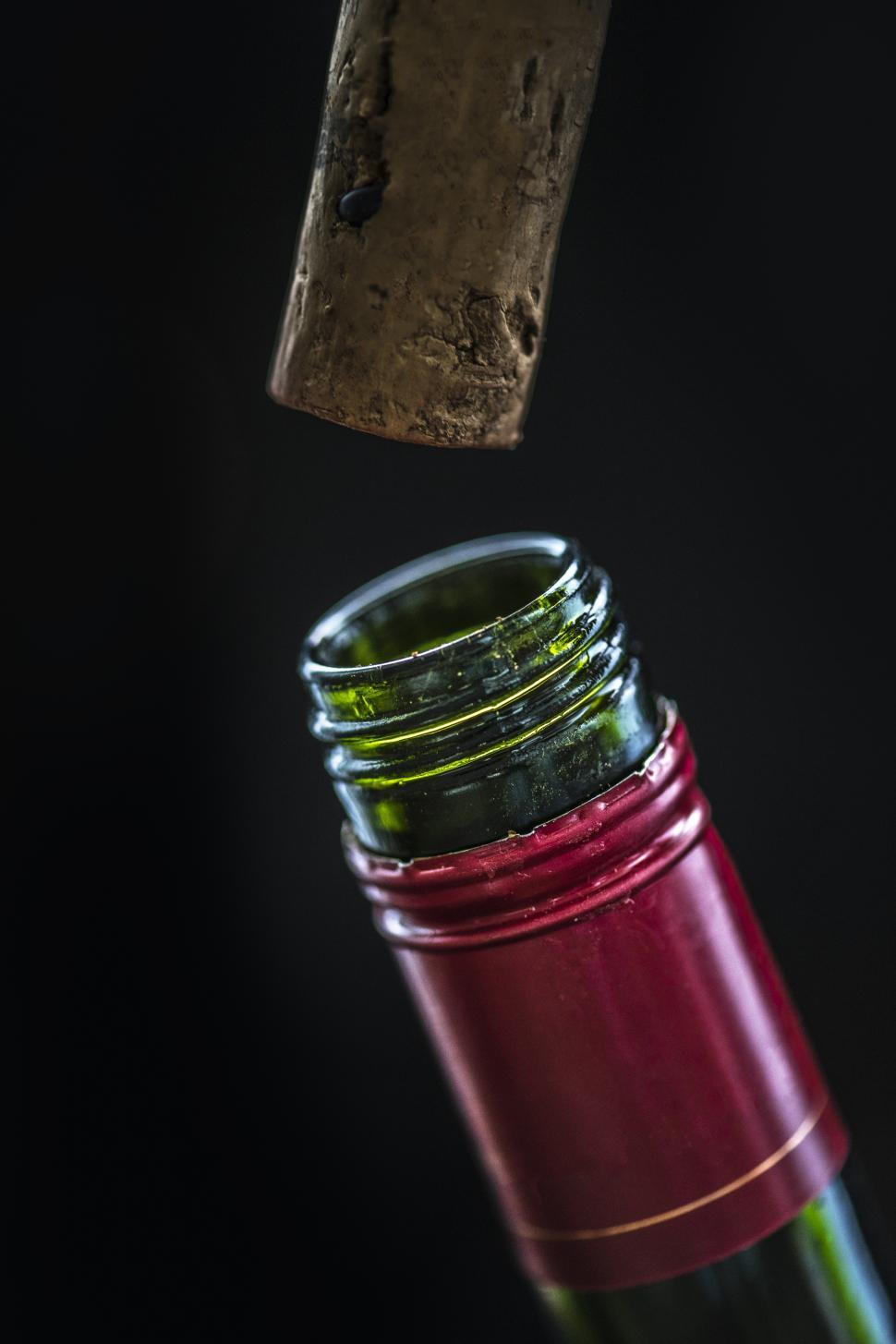 Free Image of Closeup of cork being removed from the wine bottle 