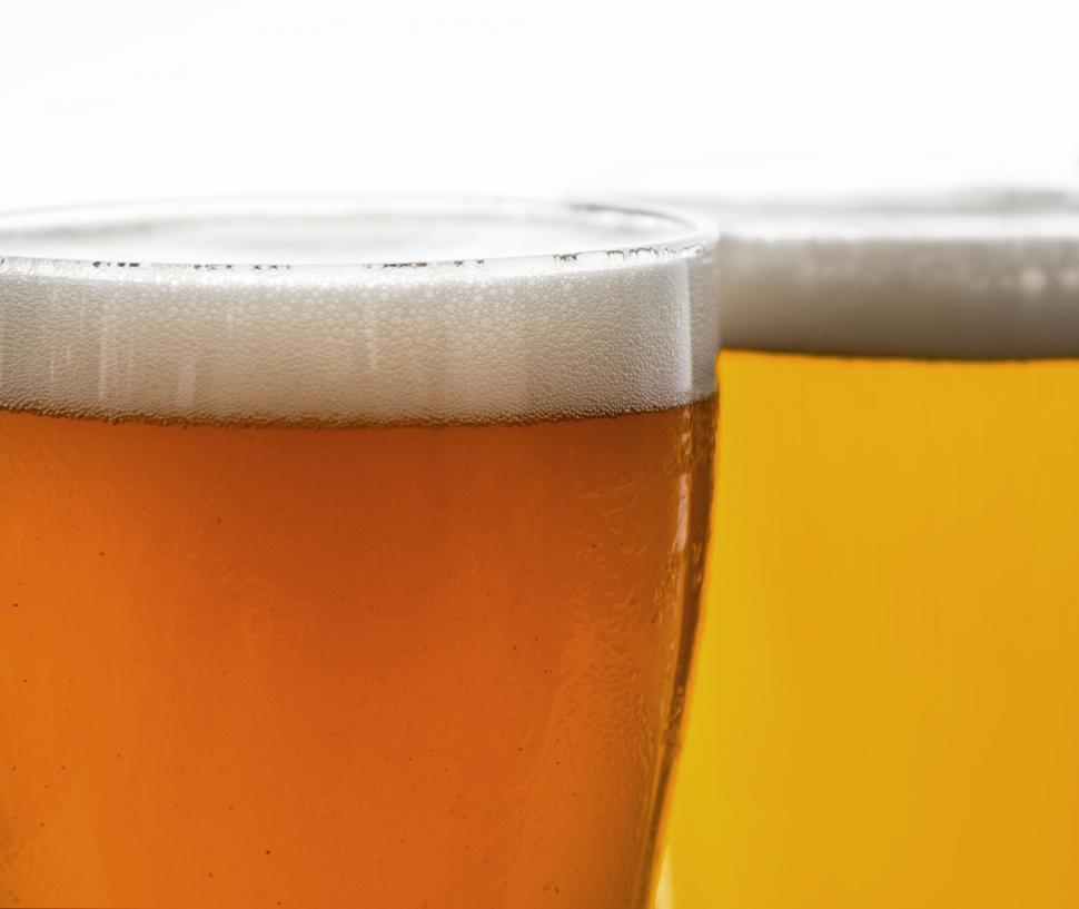 Free Image of Close up of amber and light beer foam 