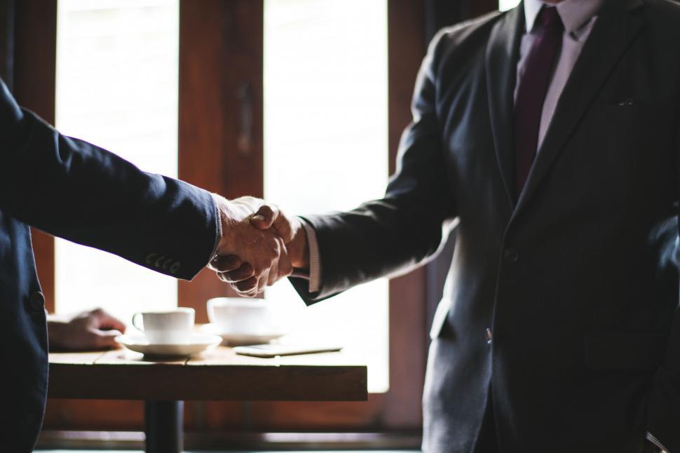 Free Image of Two business people shaking hands 