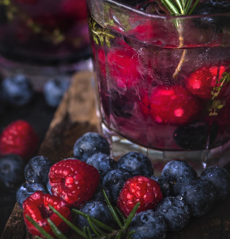 Free Image of Close up of chilled beverage with blueberry and raspberry 