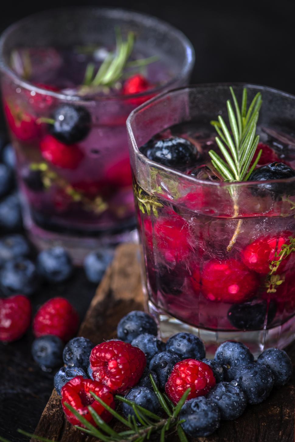 Free Image of Close up of chilled beverage with blueberry and raspberry 