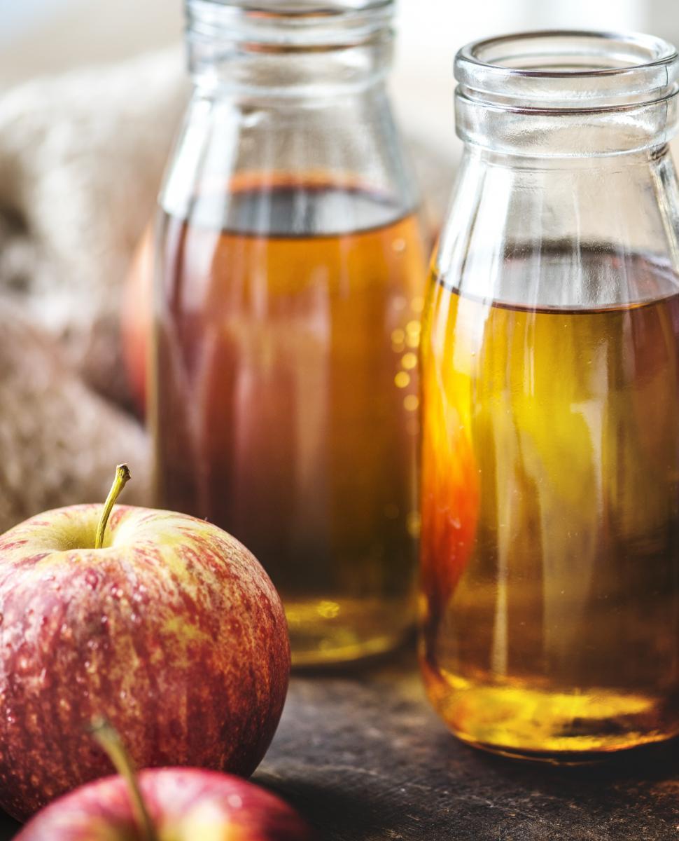 Free Image of Close up of apple juice bottles 