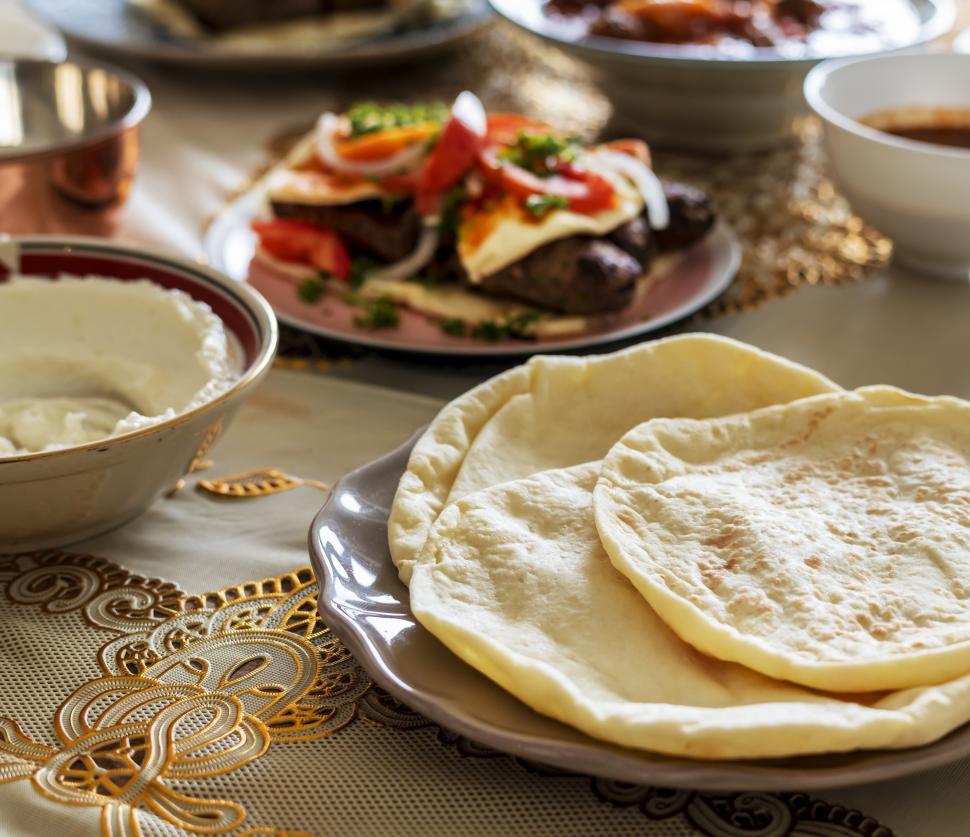 Free Image of Close up of flat breads with meal 