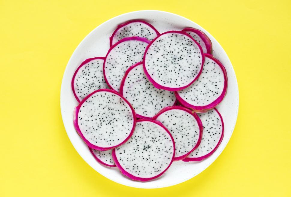 Free Image of Flat lay of dragon fruit slices 