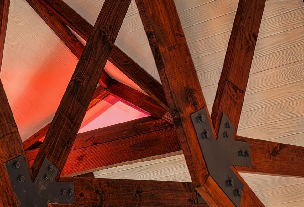 Free Image of Close Up of Wooden Structure With Red Light 