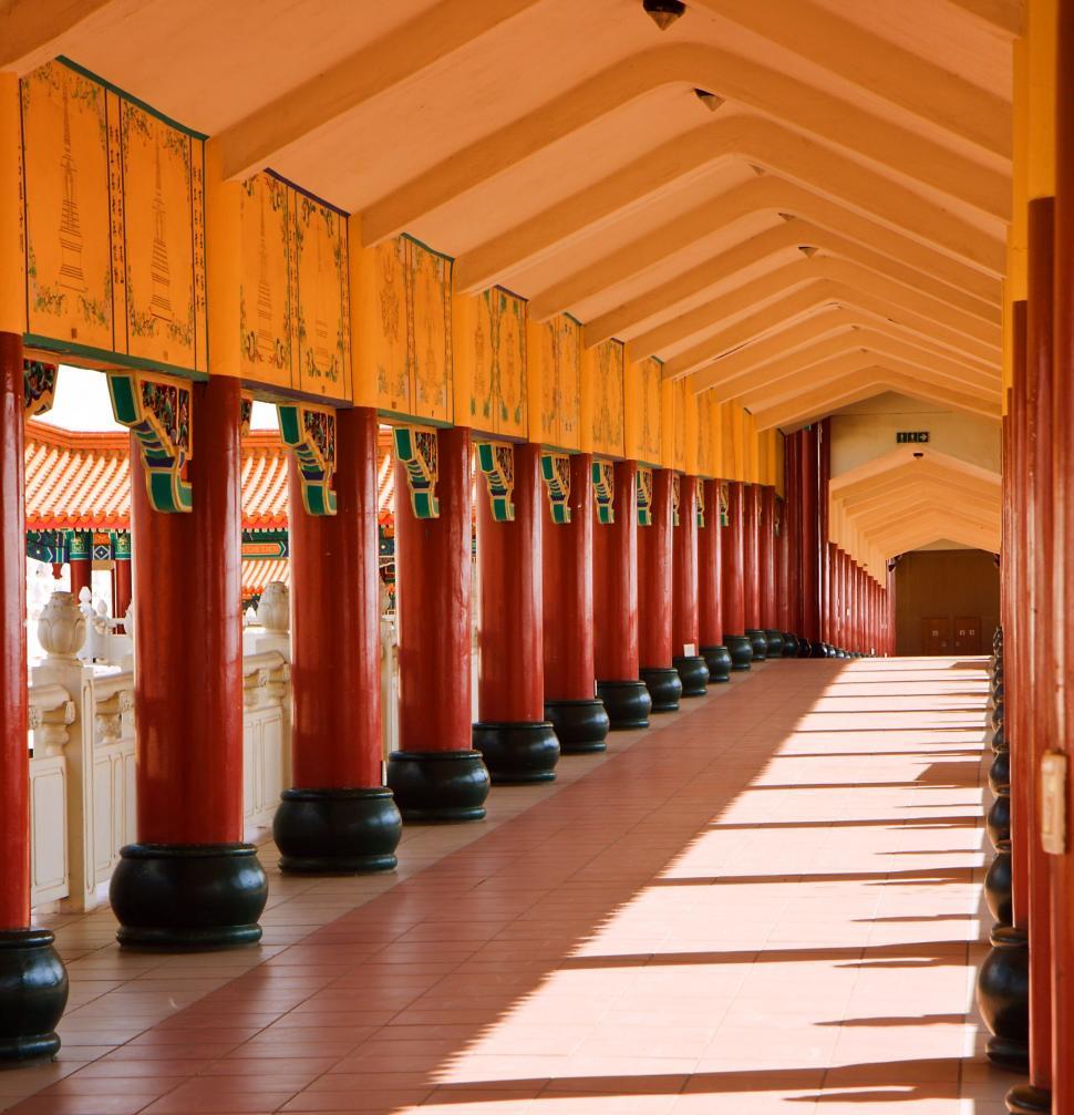Free Image of temple buddhism columns pillars perspective hallway corridor walkway religion worship nan hua temple south africa architecture culture religious fo guang shan buddhist monastery building asia asian 
